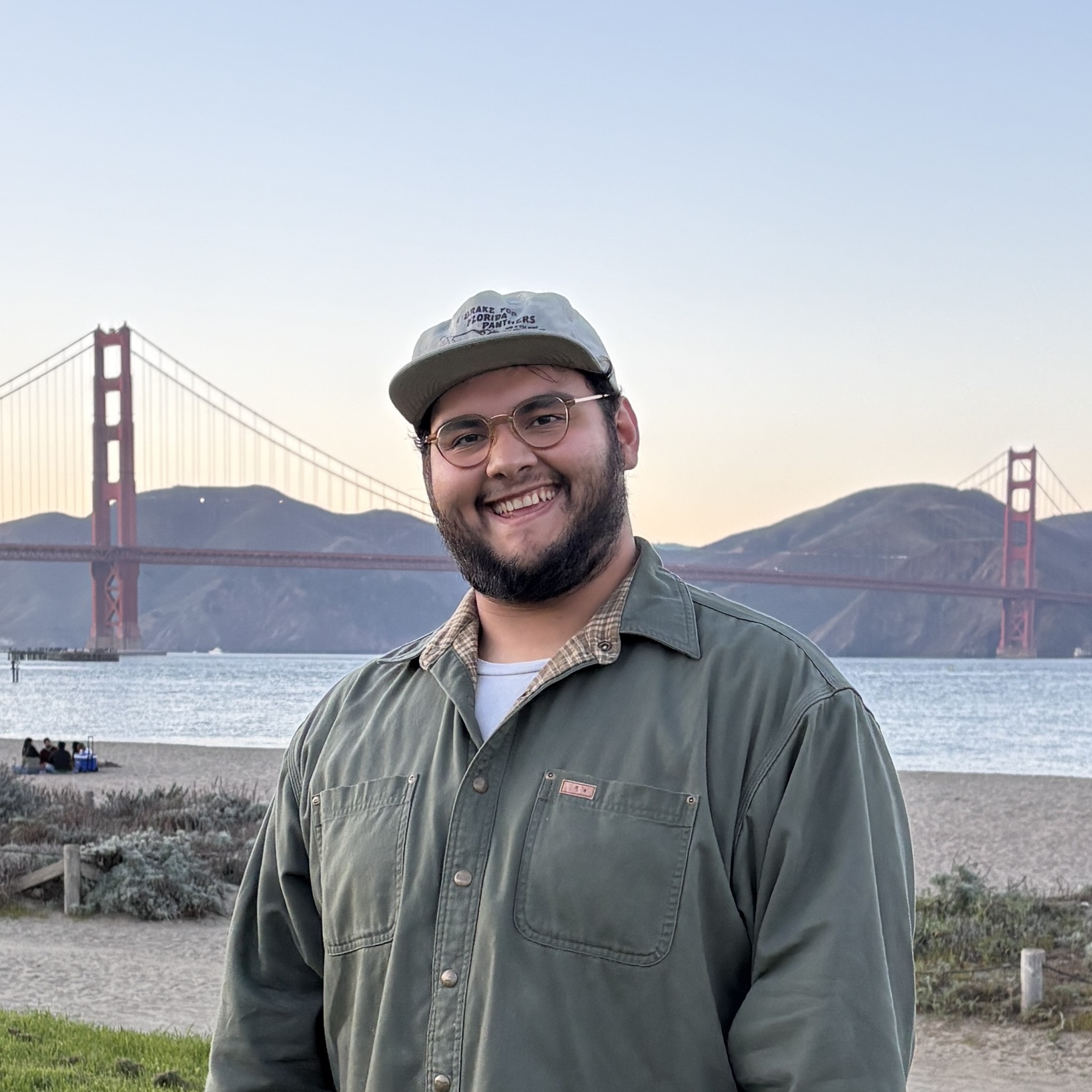 Jorge Valdez standing in front of the Golden Gate Bridge